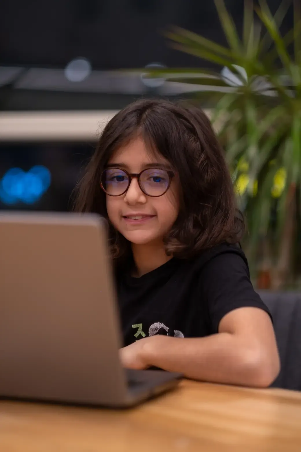 Happy child with paint-covered hands